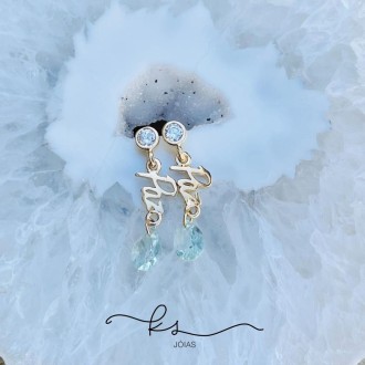 Detalhes do produto brinco ouro escrita paz pendurada com gota cristal azul